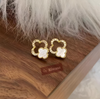 White cleef earring