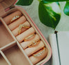 Set of 5 golden rings with hamper box