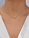 Double heart gold pendant